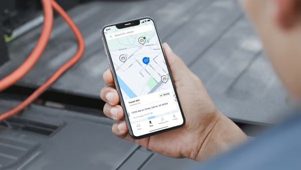 Man checking map on phone.